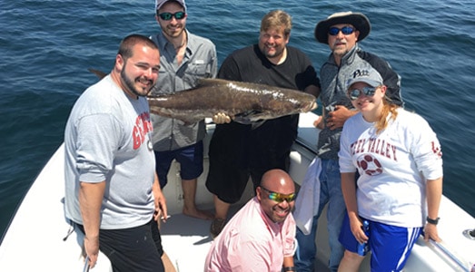 Group of angkers with Cobia fish caught on a Galveston fishing charter